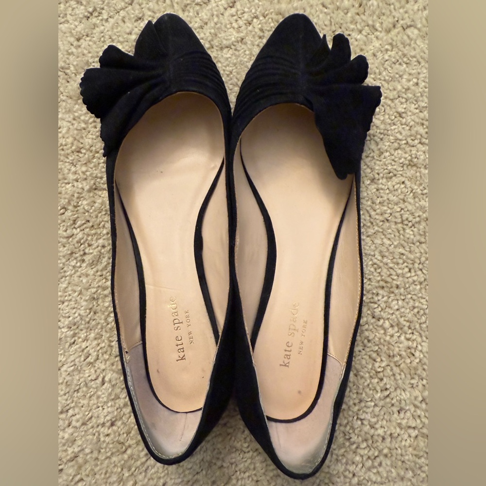 Kate Spade black flats with ruffle detail on toe. Size 10